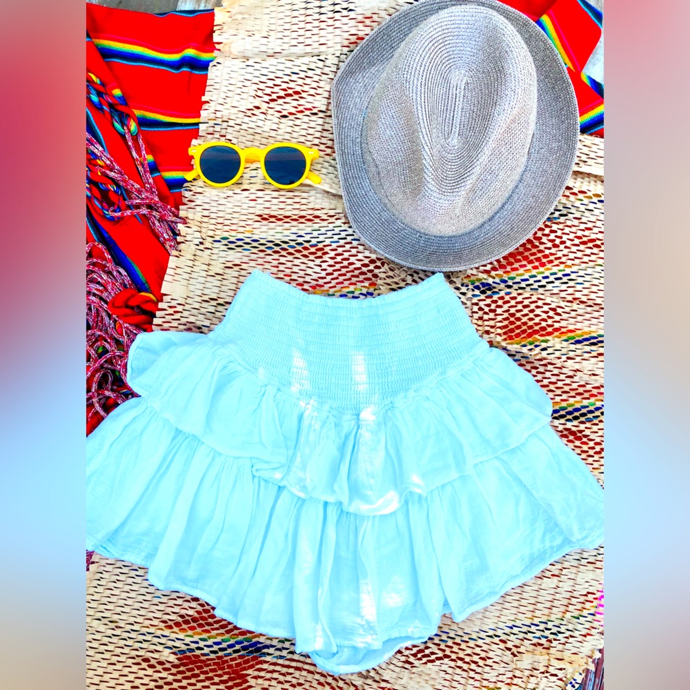I’m selling a mini skirt, cover-up, with a little short underneath.